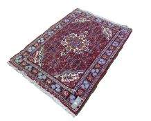 BIJAR, PERSIAN RUG with large octafoil medallion with pendants on white background, matching