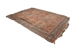 LARGE EASTERN CARPET with central medallion and six large radiating floral medallions on the brick