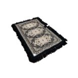 CASA PUPO STYLE FLAT WEAVE GREY RUG, with three oval panels in black rococo scroll frames, enclosing