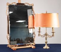 BEVEL EDGED WALL MIRROR. framed with pink tinted panels and pierced gilt wood foliate scrolls, 27" x