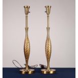 PAIR OF TWENTIETH CENTURY AMERICA GILT METAL ELECTRIC TABLE LAMPS, each of slender ovoid form with