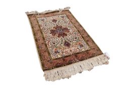 KERMANSHAH FINELY KNOTTED PERSIAN RUG, the central quatrefoil medallion pale blue and dark wine red,