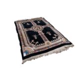 HEAVY QUALITY WASHED CHINESE LARGE RUG, with black field with pierced gallery pattern border and