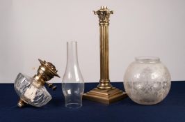 LATE VICTORIAN BRASS OIL LAMP with Corinthian column to stepped square base supporting the cut glass