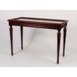 MODERN EIGHTEENTH CENTURY STYLE CARVED MAHOGANY DISPLAY TABLE, the hinged and glazed oblong top with