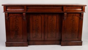 EARLY NINETEENTH CENTURY FIGURED MAHOGANY SIDEBOARD, the moulded oblong top above three concave