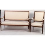 LATE NINETEENTH CENTURY FRENCH CARVED WALNUT THREE PIECE SUITE, THE SETTEE with slender, moulded