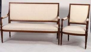 LATE NINETEENTH CENTURY FRENCH CARVED WALNUT THREE PIECE SUITE, THE SETTEE with slender, moulded