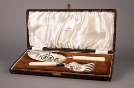 PAIR OF WALKER & HALL ELECTROPLATE SECESSIONIST STYLE FISH SERVERS with pierced blade, angular fan