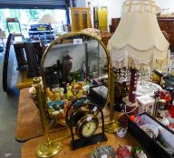 A SMALL BRASS CHEVAL MIRROR, A POTTERY TABLE LAMP AND SHADE AND A SMALL DECORATIVE CLOCK