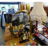 A SMALL BRASS CHEVAL MIRROR, A POTTERY TABLE LAMP AND SHADE AND A SMALL DECORATIVE CLOCK