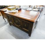 TWENTIETH CENTURY OAK BLANKET CHEST WITH THREE PANEL FRONT