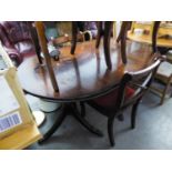 A MAHOGANY REPRODUCTION EXTENDING 'BRIDGECRAFT' DINING TABLE AND FOUR DINING CHAIRS (2+2) (5)
