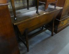 AN OAK DOUGH TROUGH, RECTANGULAR WITH LID, SLOPING SIDES, ON LEGS WITH STRETCHER RAILS, 4? LONG, 1?