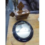 AN OAK MURAL COLLECTION BOX AND A SMALL CIRCULAR FRAMED WALL MIRROR (2)