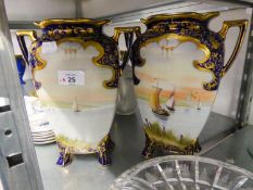 A NORITAKE PAIR OF TWO HANDLED VASES