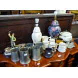 *FIVE VARIOUS PEWTER TANKARDS, FIVE POTTERY TANKARDS, TWO POTTERY LAMPS, MAN FISHING IN A BOAT