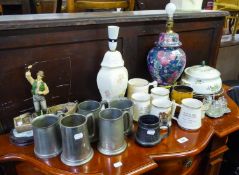 *FIVE VARIOUS PEWTER TANKARDS, FIVE POTTERY TANKARDS, TWO POTTERY LAMPS, MAN FISHING IN A BOAT