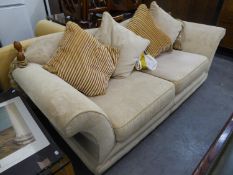 A MODERN FULLY UPHOLSTERED TWO SEATER SETTEE WITH FOUR LARGE LOOSE CUSHIONS