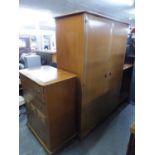 A STAG LIGHTWOOD TWO DOOR WARDROBE AND A CHEST OF FOUR LONG DRAWERS WITH A ROW OF THREE SMALL