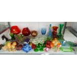 A SELECTION OF COLOURED GLASSWARES TO INCLUDE; A SET OF SIX GREEN STEM WINE GLASSES, A QUANTITY OF