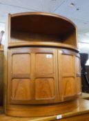 NATHAN, TEAK BOW FRONTED SIDE CABINET, WITH OPEN COMPARTMENT OVER CUPBOARD WITH TWO FOUR PANEL