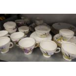 A COLCLOUGH BONE CHINA PART TEA SERVICE AND A ROYAL VALE BONE CHINA TEA SERVICE FOR 6 PERSONS