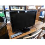 TOSHIBA SMALL FLAT SCREEN TELEVISION AND REMOTE CONTROL, 21? AND A WOODEN TWO  TIER TELEVISION