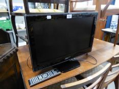 TOSHIBA SMALL FLAT SCREEN TELEVISION AND REMOTE CONTROL, 21? AND A WOODEN TWO  TIER TELEVISION