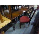 MAHOGANY DINING TABLE, ON TURNED SUPPORTS, THREE MAHOGANY DINING CHAIRS AND A LONG LOW COFFEE