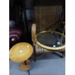 A WICKER WORK OPEN ARMCHAIR, A CIRCULAR GILT FRAMED WALL MIRROR AND A SMALL CIRCULAR PEDESTAL