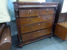 A LARGE VICTORIAN MAHOGANY CHEST OF TWO SHORT AND THREE LONG DRAWERS AND A LONG SECRET DRAWER ABOVE,