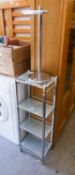 BRIGHT STEEL FRAMED WHAT-NOT WITH FOUR GLASS SQUARE SHELVES AND BRIGHT METAL TOILET ROLL PEDESTAL
