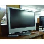 A SONY 32" FLAT SCREEN TV AND REMOTE CONTROL