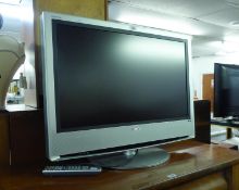 A SONY 32" FLAT SCREEN TV AND REMOTE CONTROL
