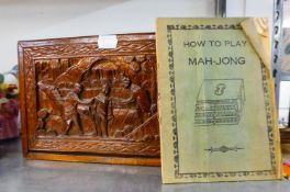 A MAH-JONG SET, CONTAINED IN A CARVED REDWOOD CASE, WITH SLIDING FRONT TO REVEAL FIVE DRAWERS