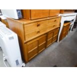 NATHAN, TEAK SIDEBOARD WITH STEPPED TOP, HAVING A NEST OF FOUR SHORT DRAWERS OVER A BASE WITH TWO