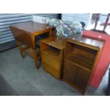 A TEAK PEMBROKE TWO TIER TEA TROLLEY AND A PAIR OF TEAK BEDSIDE CUPBOARDS