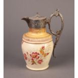 *LATE VICTORIAN FLORAL PRINTED BLUSH POTTERY HOT WATER JUG WITH ELECTROPLATED MOUNTS, 9? (22.9cm)