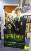 A 'HARRY POTTER AND THE CHAMBER OF SECRETS' CARDBOARD POP-UP ADVERTISING DISPLAY, A SIMILAR '