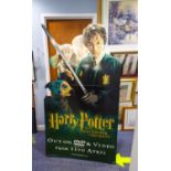 A 'HARRY POTTER AND THE CHAMBER OF SECRETS' CARDBOARD POP-UP ADVERTISING DISPLAY, A SIMILAR '