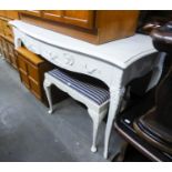*A MODERN WHITE PAINTED SERPENTINE FRONTED DRESSING TABLE, A TRIPTYCH MIRROR, DRESSING TABLE STOOL