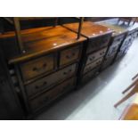 A PAIR OF SMALL MAHOGANY CHESTS, EACH OF TWO SHORT AND TWO LONG DEEP DRAWERS, ON BALL FEET, 2'3"