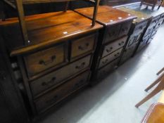 A PAIR OF SMALL MAHOGANY CHESTS, EACH OF TWO SHORT AND TWO LONG DEEP DRAWERS, ON BALL FEET, 2'3"