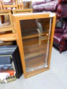 NATHAN, TEAK MURAL DISPLAY CABINET WITH GLAZED PANEL DOOR ENCLOSING FOUR PLATE GLASS SHELVES, 3'8"