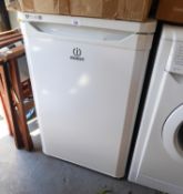 AN INDESIT SMALL REFRIGERATOR