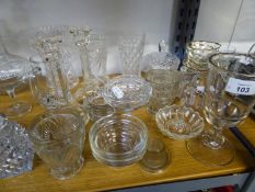 A LARGE QUANTITY OF CUT AND MOULDED GLASSWARES TO INCLUDE; DECANTER, VASES, BOWLS, STEM GLASSES