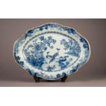 NINETEENTH CENTURY CHINESE BLUE AND WHITE PORCELAIN PLATTER, of shaped oval form, painted with