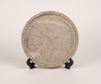 STUDIO POTTERY PLATE with grey mottled glazed top, cavetto rim, grey glazed outside of the rim,