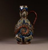 DOULTON LAMBETH MOULDED STONEWARE EWER BY FRANK BUTLER, of footed form with slightly flared neck and